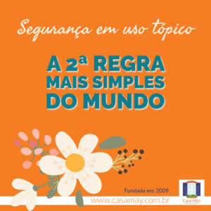 A imagem mostra o desenho de um ramo com duas flores, frutinhas e florescência e a frase: Segurança em uso tópico: a 2ª regra mais simples do mundo. Completam a imagem o desenho de uma janela aberta com floreira, que é o logo da Casa Máy, e o site www.casamay.com.br.